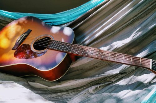 acoustic guitar on hammock