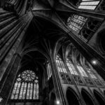 grayscale photography of cathedral ceiling