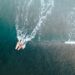 aerial shot of surfers on the sea