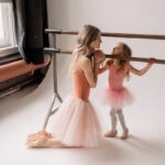 mother and daughter practising ballet