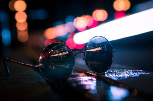 selective focus photography of sunglasses